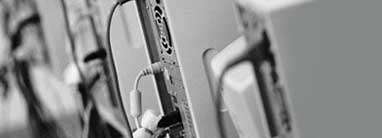 Header image showing rack-mounted equipment at an oblique angle